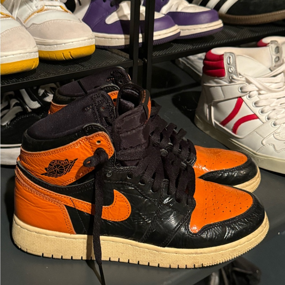 Nike Black and Orange High-Top Sneakers